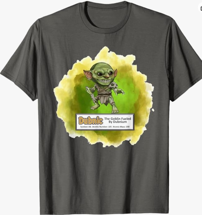 Graphic t-shirt featuring a cartoon goblin with green skin and mischievous expression, surrounded by a colorful splash design. Text reads 'Dubnic: The Goblin Fueled By Dubnium'.